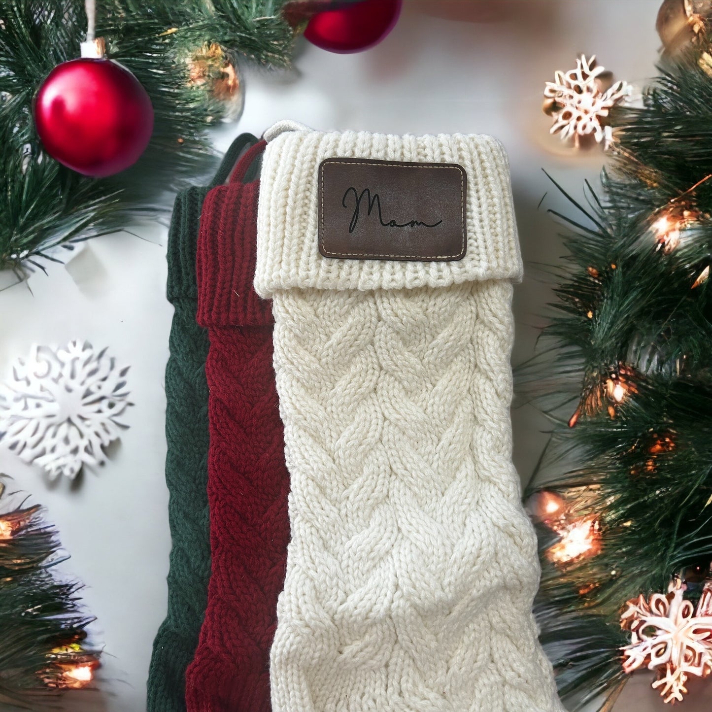 Knitted stocking with leather patch.